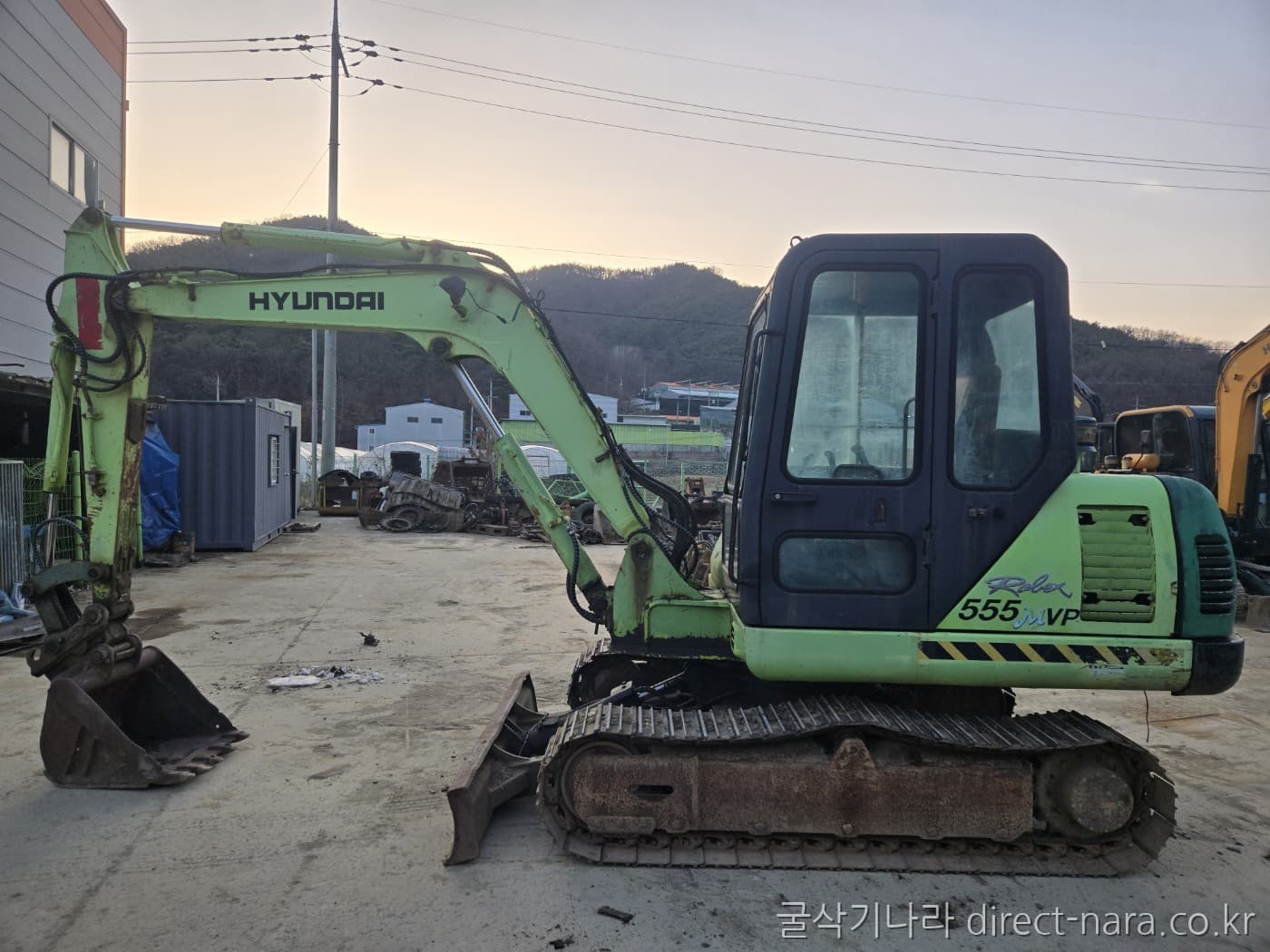 HD Hyundai R555MVP2003